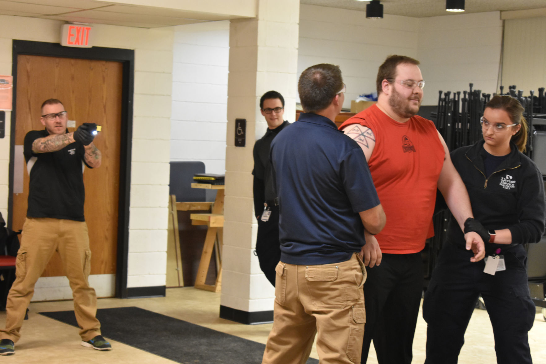 Derrick Rowher braces for the Taser